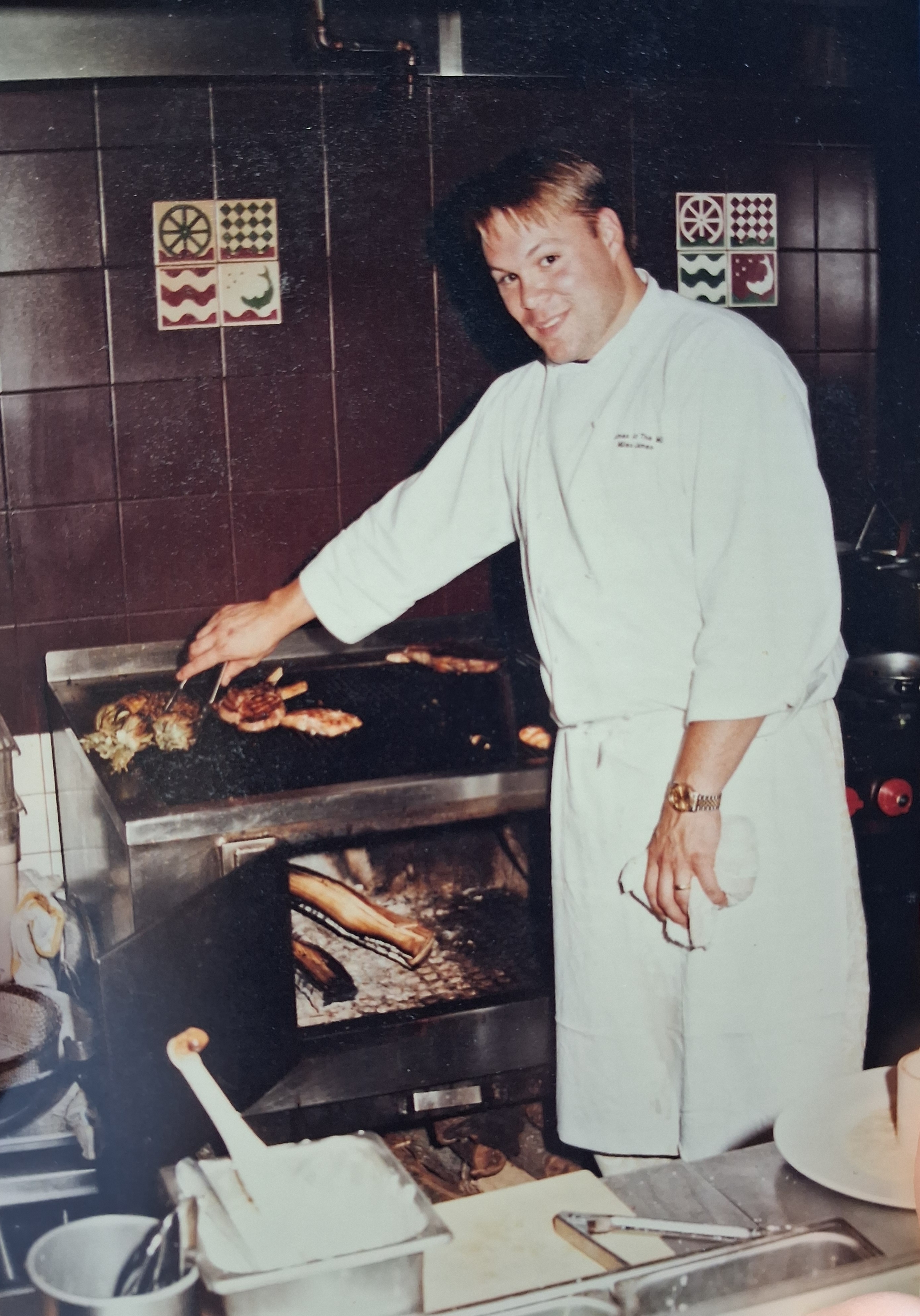 Chef Miles James at the wood-fired grill.