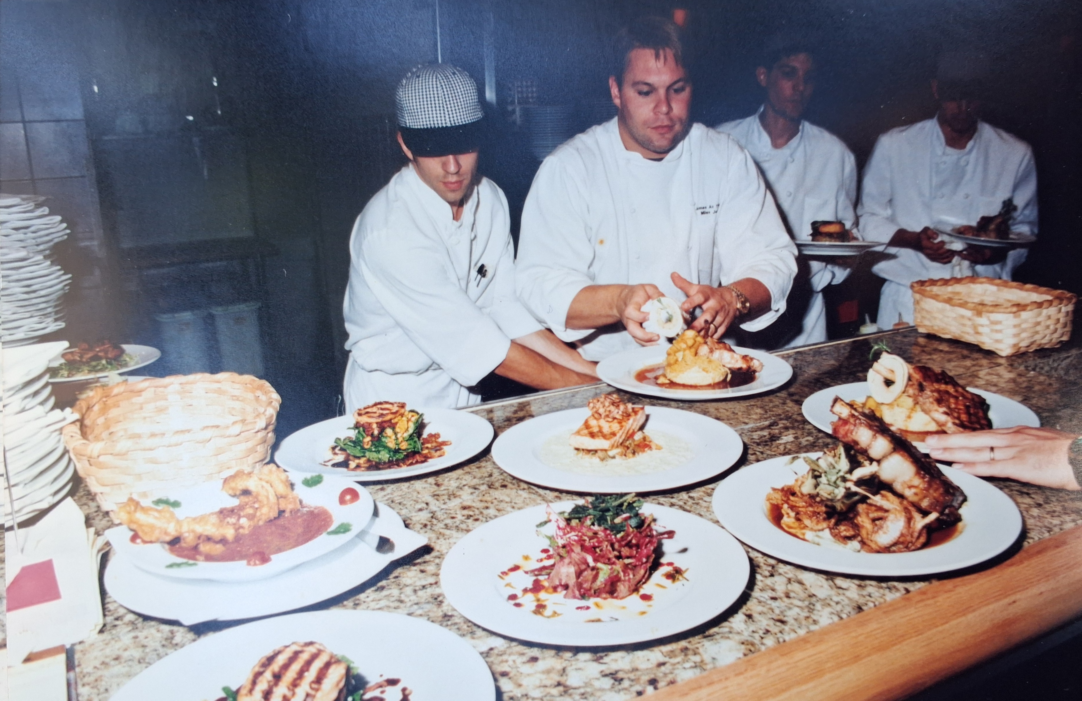 The kitchen brigade working with Chef Miles James.
